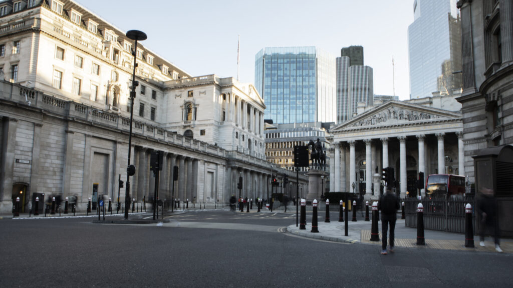 Aerial view of diverse London neighbourhoods with traditional British architecture, greenery, and modern urban life — ideal for expats exploring living option