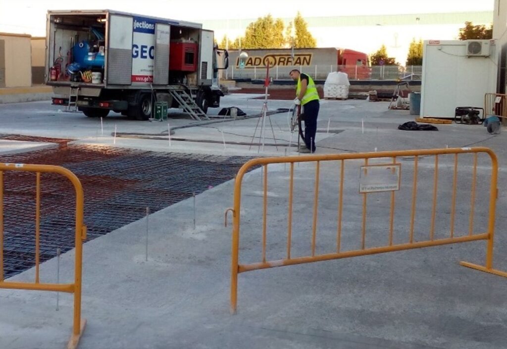 Expansive resin injection stabilising industrial floor in the UK